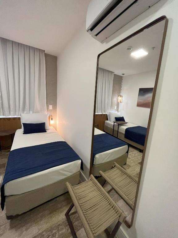 Krevet ili kreveti u jedinici u objektu Leblon Design Hotel