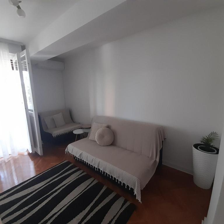 Postel nebo postele na pokoji v ubytování Apartman Mika **Centar **