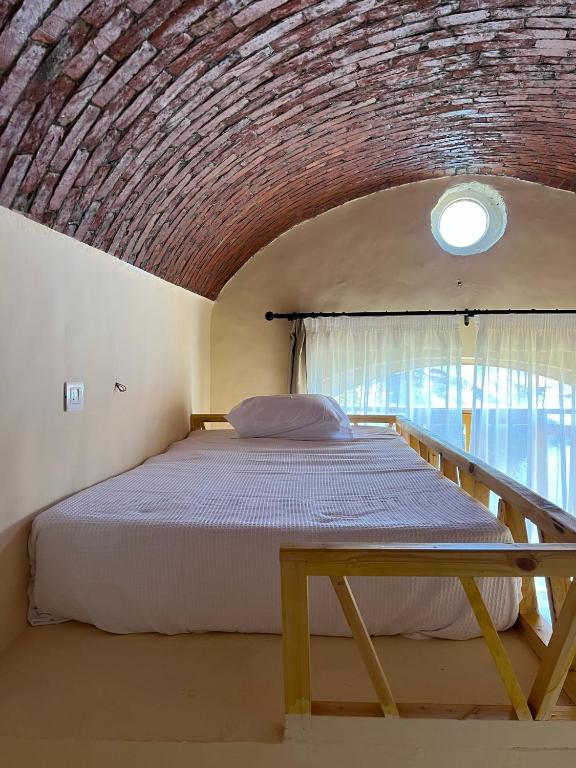 Postel nebo postele na pokoji v ubytování Ayujidda Nubian House
