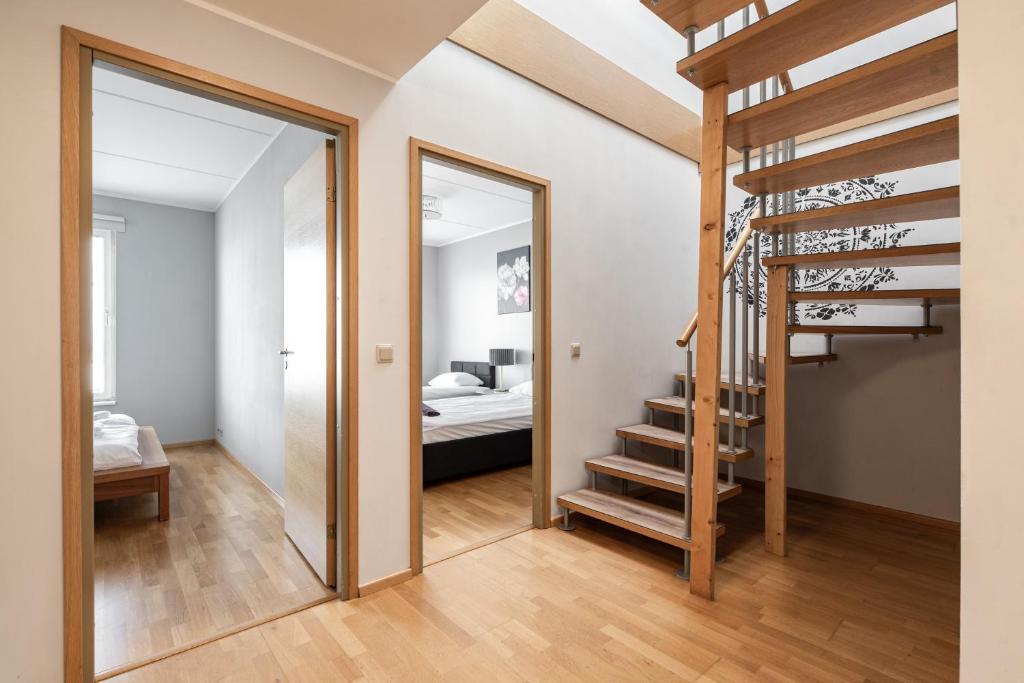 Postel nebo postele na pokoji v ubytování AirHome - Heart of City Center