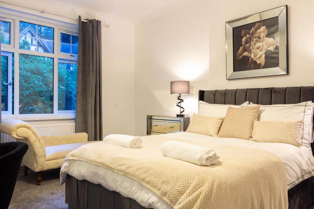 Säng eller sängar i ett rum på Mapperley Park Guesthouse