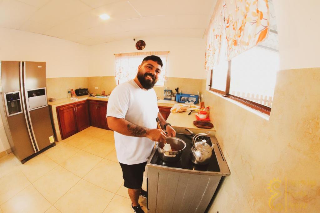 Kuchyň nebo kuchyňský kout v ubytování Hostal Punta Arena