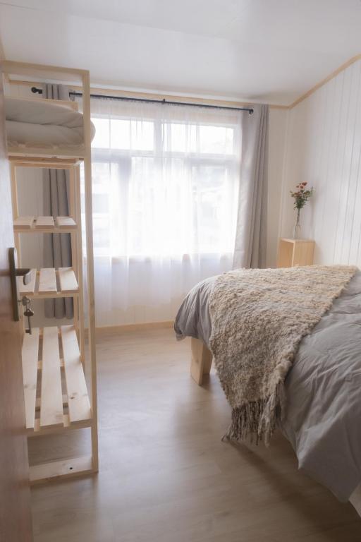 Postel nebo postele na pokoji v ubytování Refugio Ballena Hostel