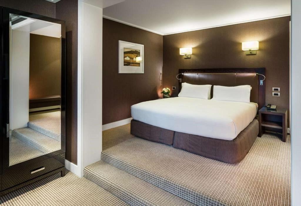 Postel nebo postele na pokoji v ubytování Hilton Queenstown Resort & Spa