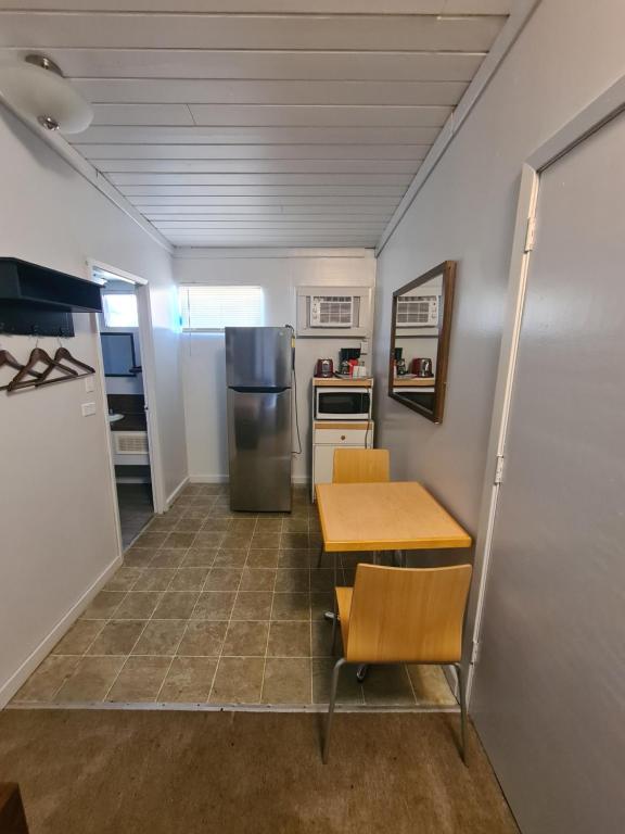 Kuchyň nebo kuchyňský kout v ubytování Sundowner Motel