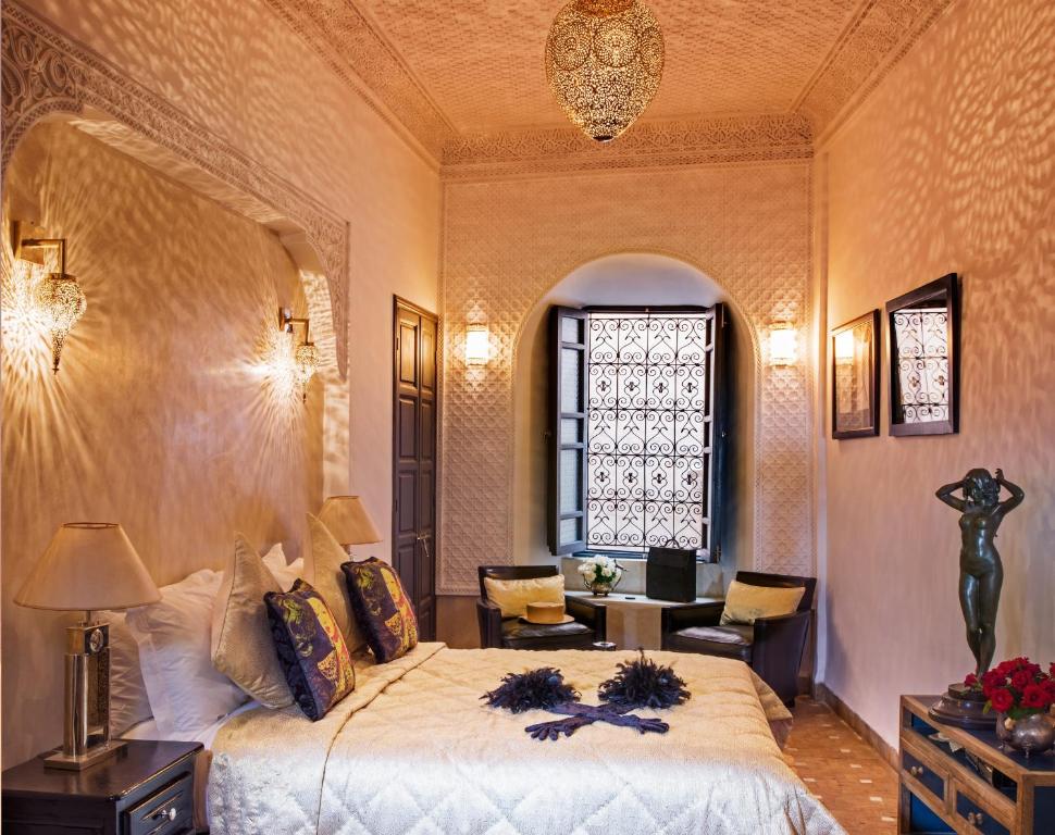 Postel nebo postele na pokoji v ubytování Riad Star by Marrakech Riad