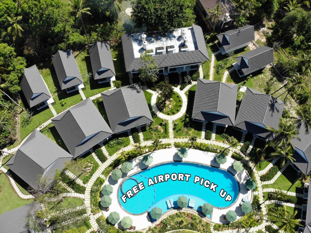 an aerial view of a resort with a pool at Kingo Retreat Resort in Phu Quoc