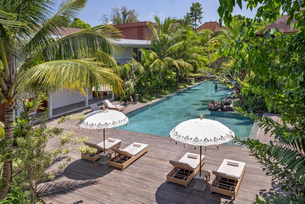Výhled na bazén z ubytování The Hava Ubud A Pramana Experience nebo okolí