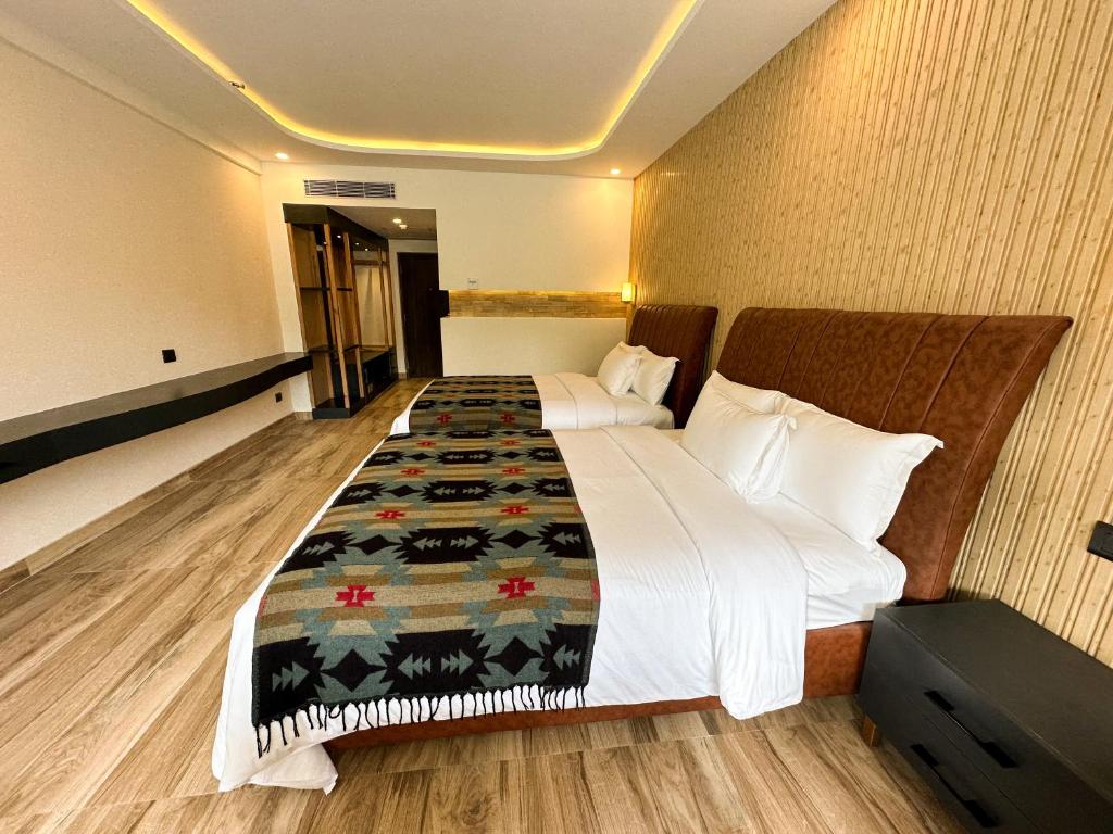 Letto o letti in una camera di Lake View Resort