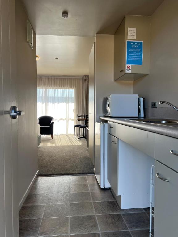 Kuchyň nebo kuchyňský kout v ubytování The Suites Ashburton