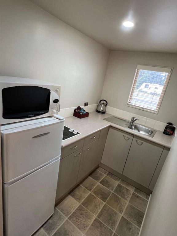 Kuchyň nebo kuchyňský kout v ubytování The Suites Ashburton