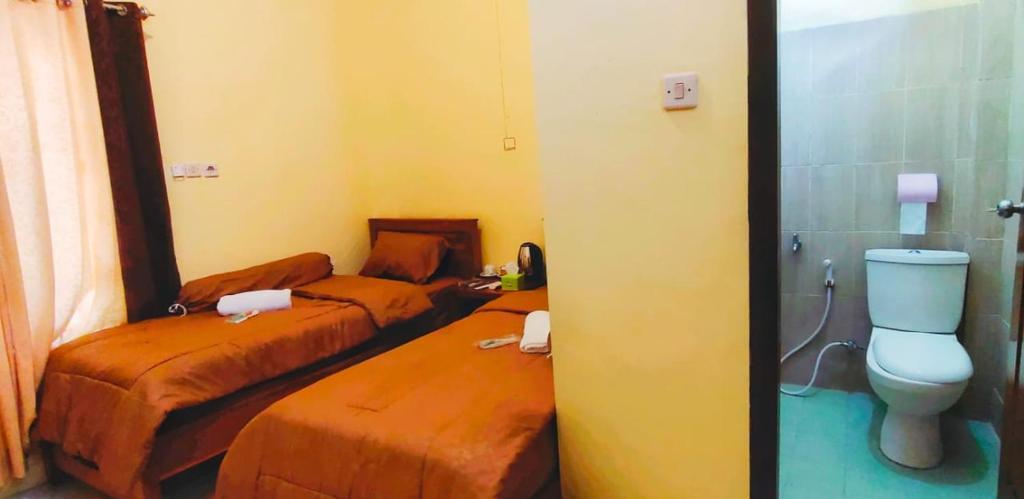 FIFAWIND HOTEL - Twin Room With Private Bathroom