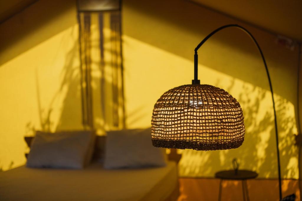 Postel nebo postele na pokoji v ubytování Layla Glamping