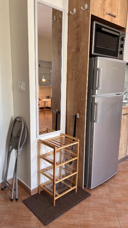 Kuchyň nebo kuchyňský kout v ubytování Marina Apartment