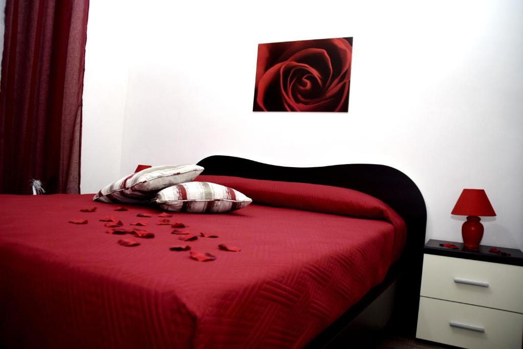 Łóżko lub łóżka w pokoju w obiekcie Incanto Marino
