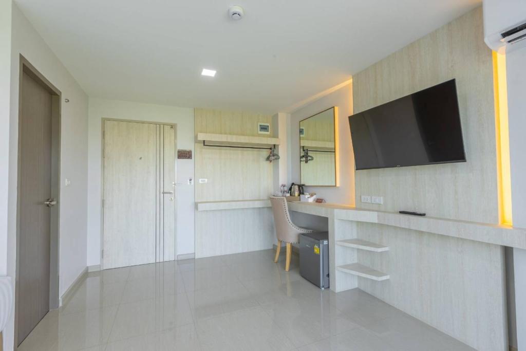 Kuchyň nebo kuchyňský kout v ubytování Sananwan Hometel
