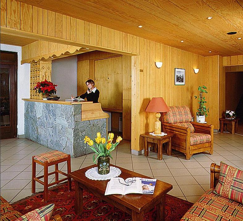 Posezení v ubytování Hôtel Le Dôme