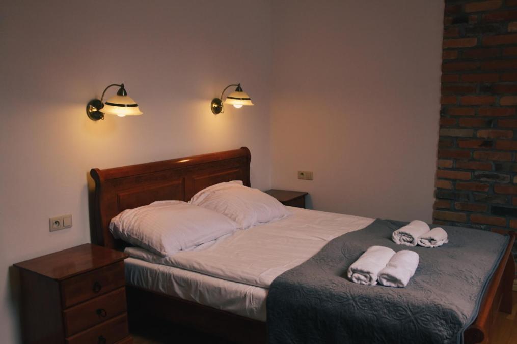 Katil atau katil-katil dalam bilik di Hotel Gość w dom