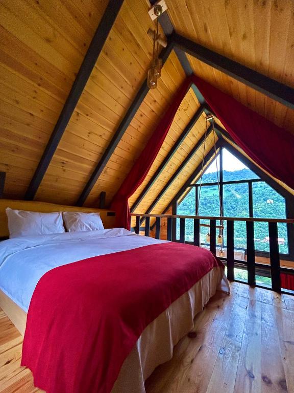 Postel nebo postele na pokoji v ubytování CİLEMONA SUİT BUNGALOWS