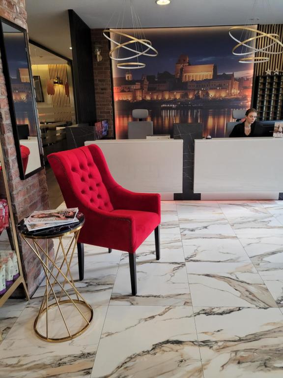 Posezení v ubytování Hotel Przystanek Torun