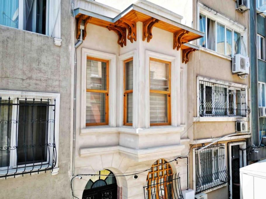 a building with a window on the side of it at Refurbished Triplex in Taksim in Istanbul