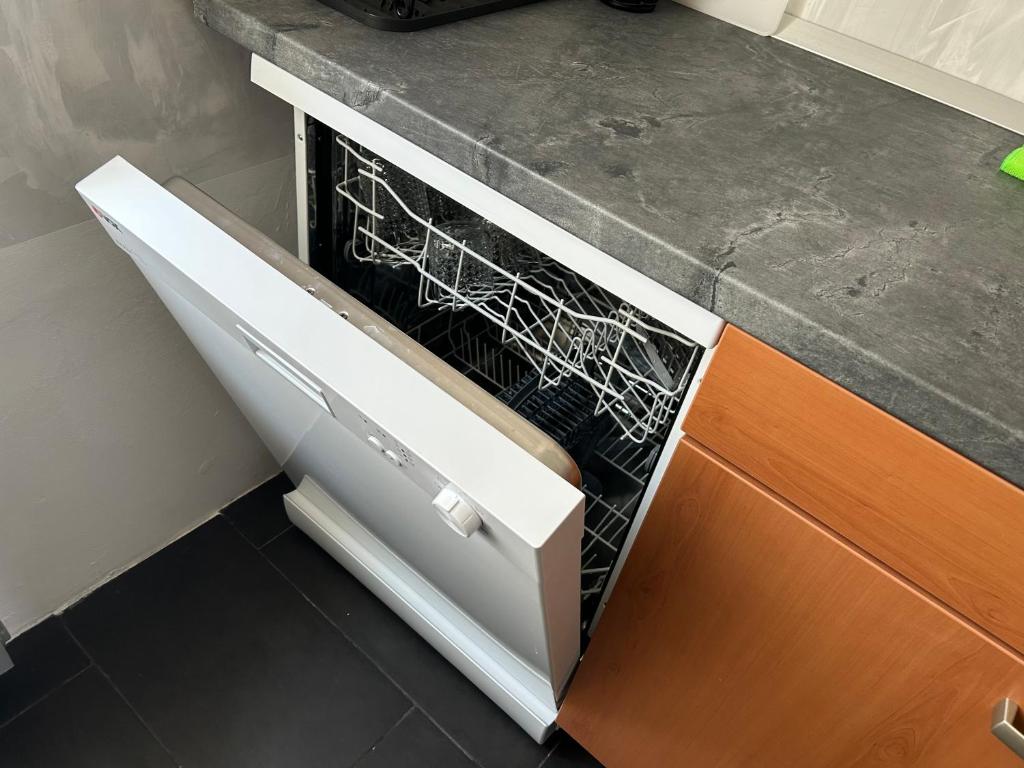 Kuchyň nebo kuchyňský kout v ubytování APARTMENT GAL