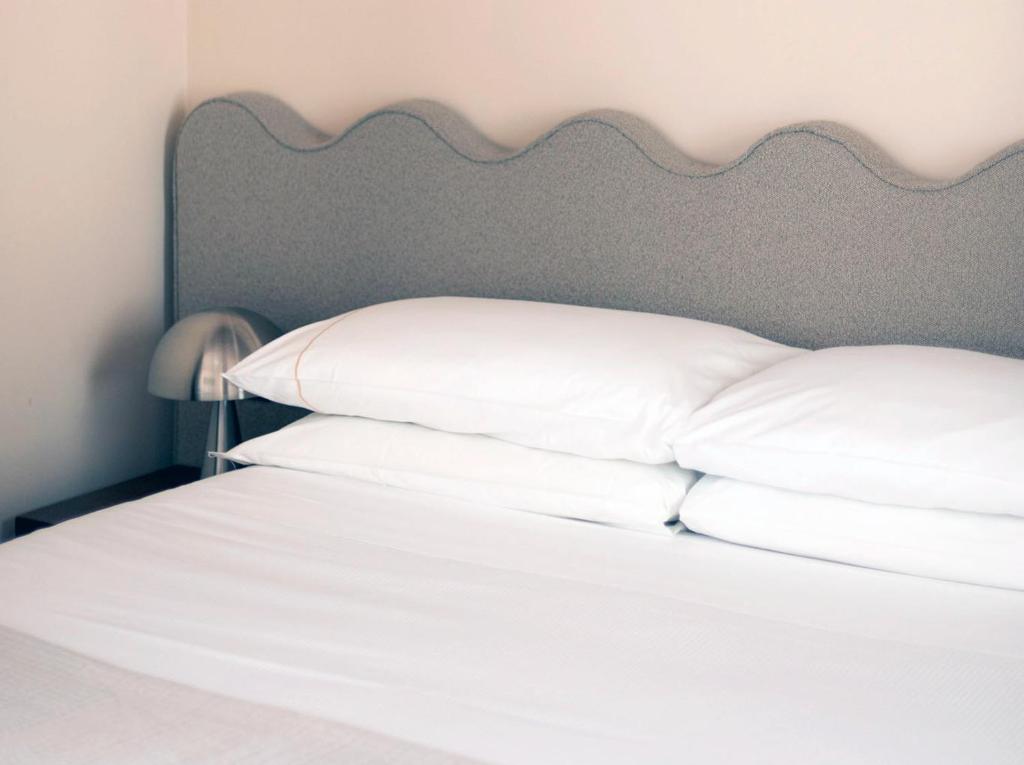 Postel nebo postele na pokoji v ubytování c-hotels Atlantic