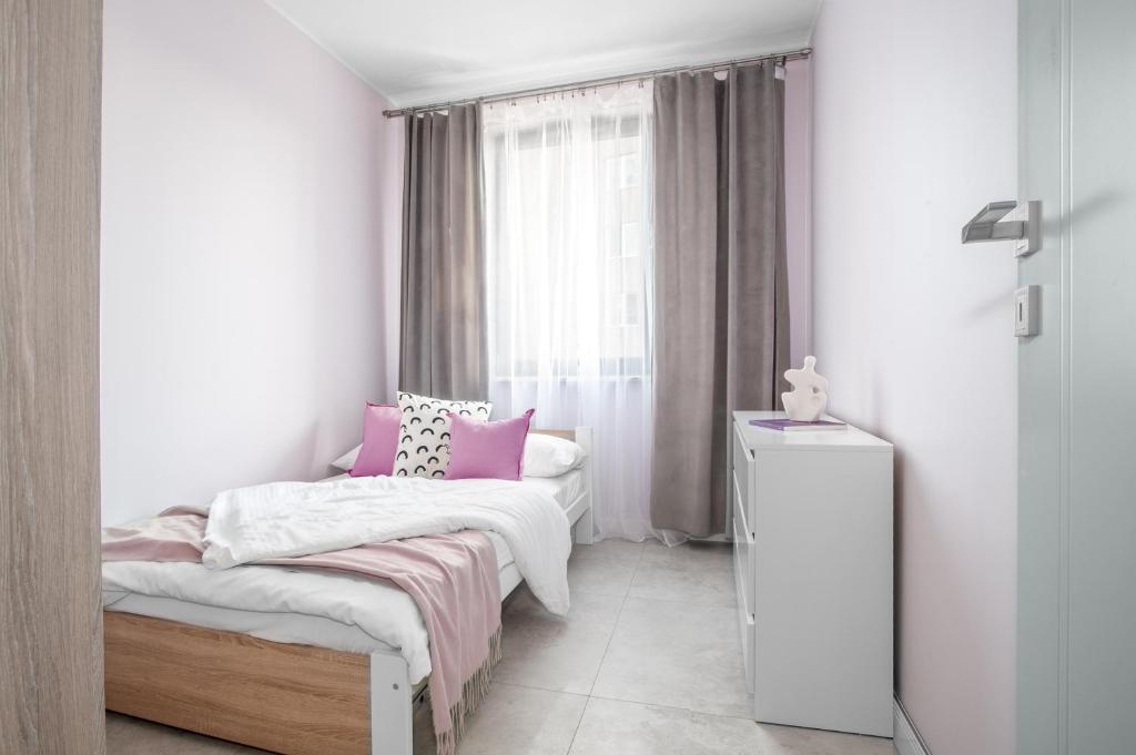 Posteľ alebo postele v izbe v ubytovaní M&J Apartments - Garden Gates