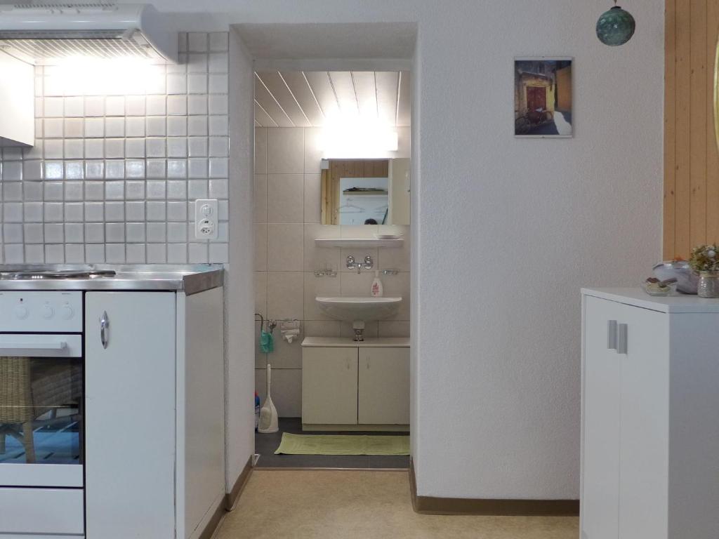Kuchyň nebo kuchyňský kout v ubytování Apartment Rösli by Interhome