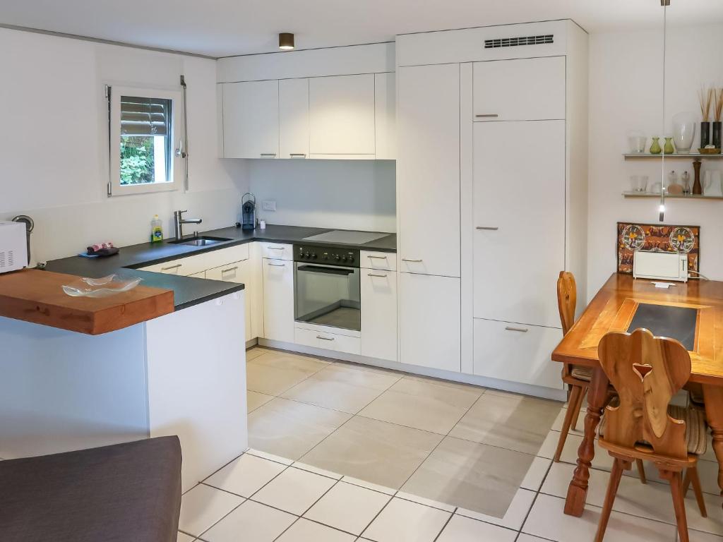 Kuchyň nebo kuchyňský kout v ubytování Apartment Tavaun A11 by Interhome