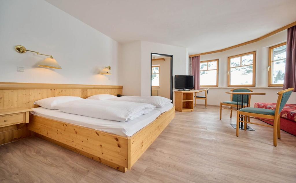 Postel nebo postele na pokoji v ubytování Heart Hotel Aurora