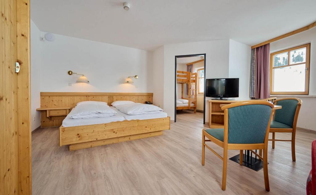 Postel nebo postele na pokoji v ubytování Heart Hotel Aurora