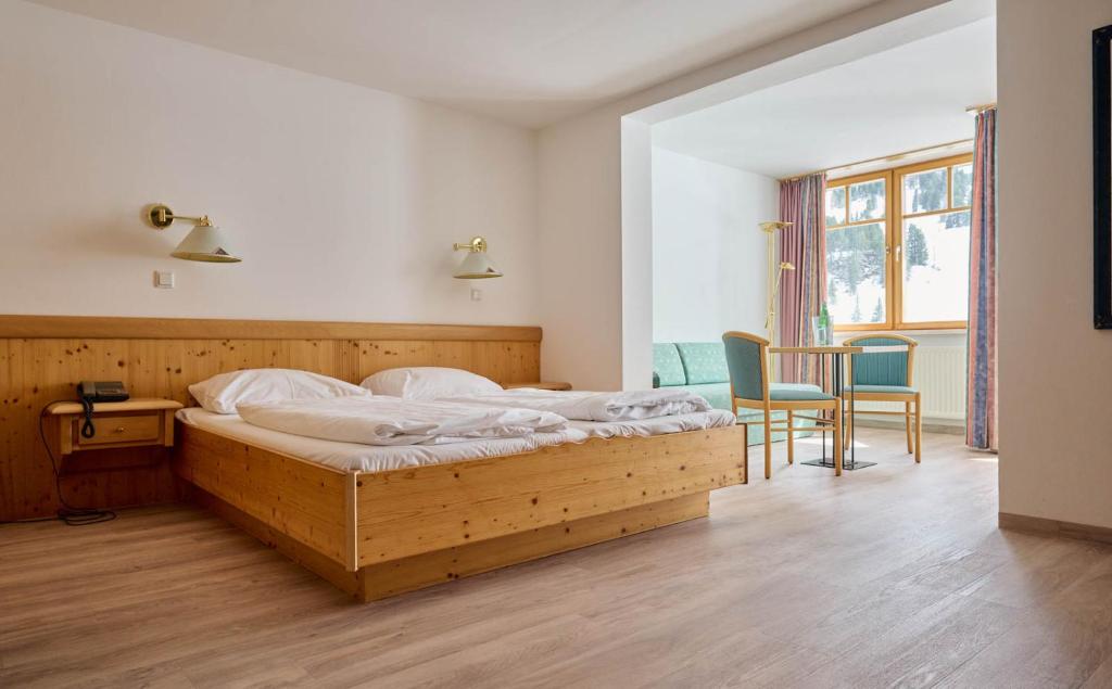 Postel nebo postele na pokoji v ubytování Heart Hotel Aurora