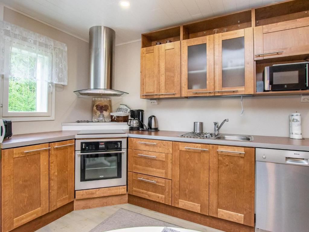 Kuchyň nebo kuchyňský kout v ubytování Holiday Home Eteläaho by Interhome
