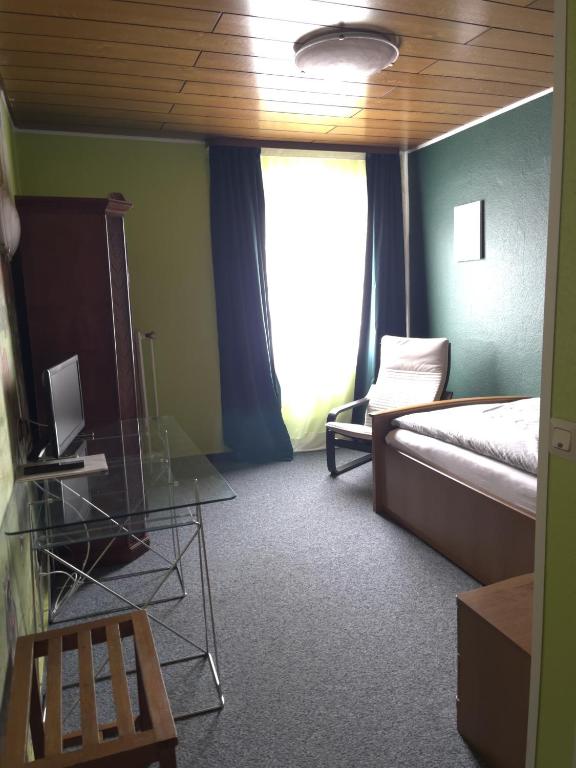 TV a/nebo společenská místnost v ubytování Bartels Stadt-Hotel