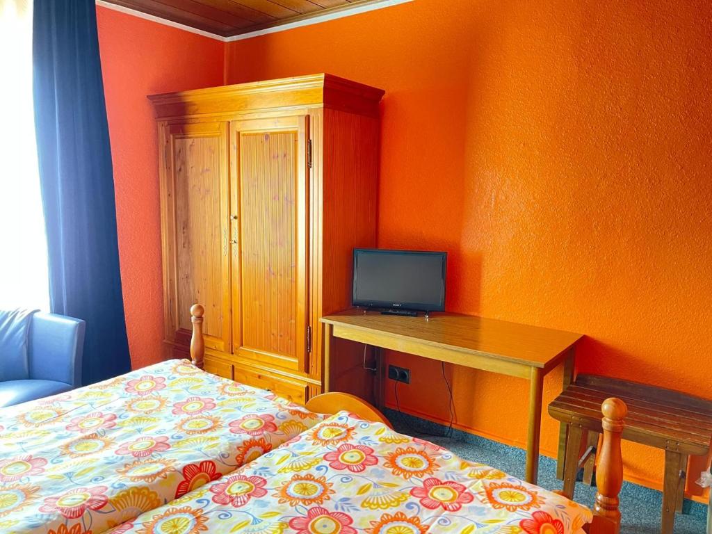 TV a/nebo společenská místnost v ubytování Bartels Stadt-Hotel