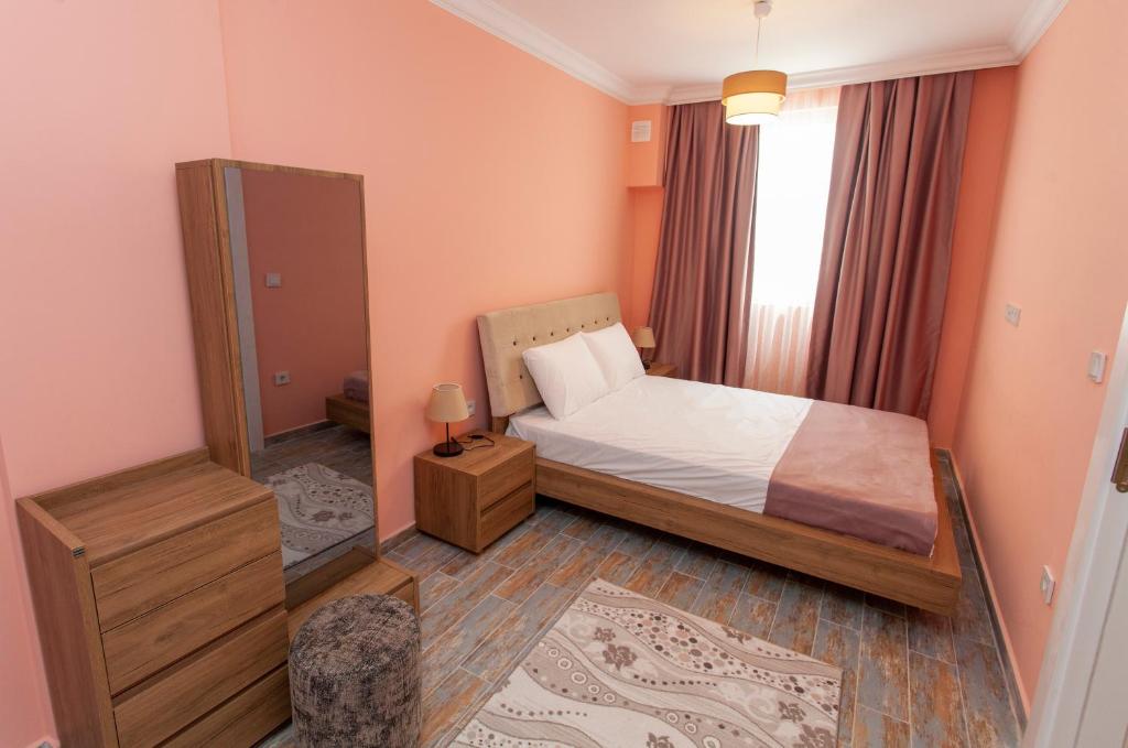 Postel nebo postele na pokoji v ubytování Roses Villa