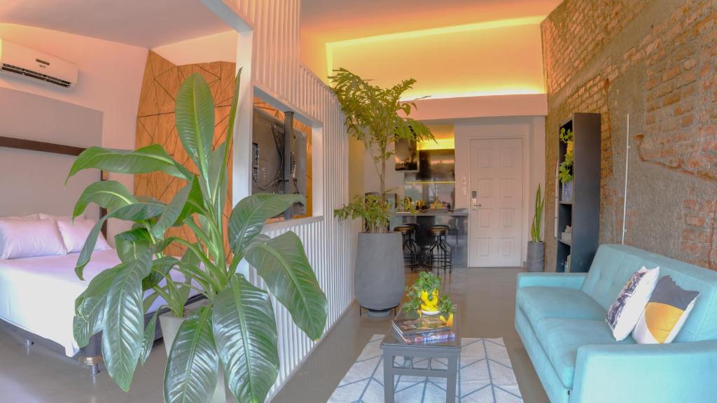 Uma área de estar em Hotel El Peñon by Bithotels