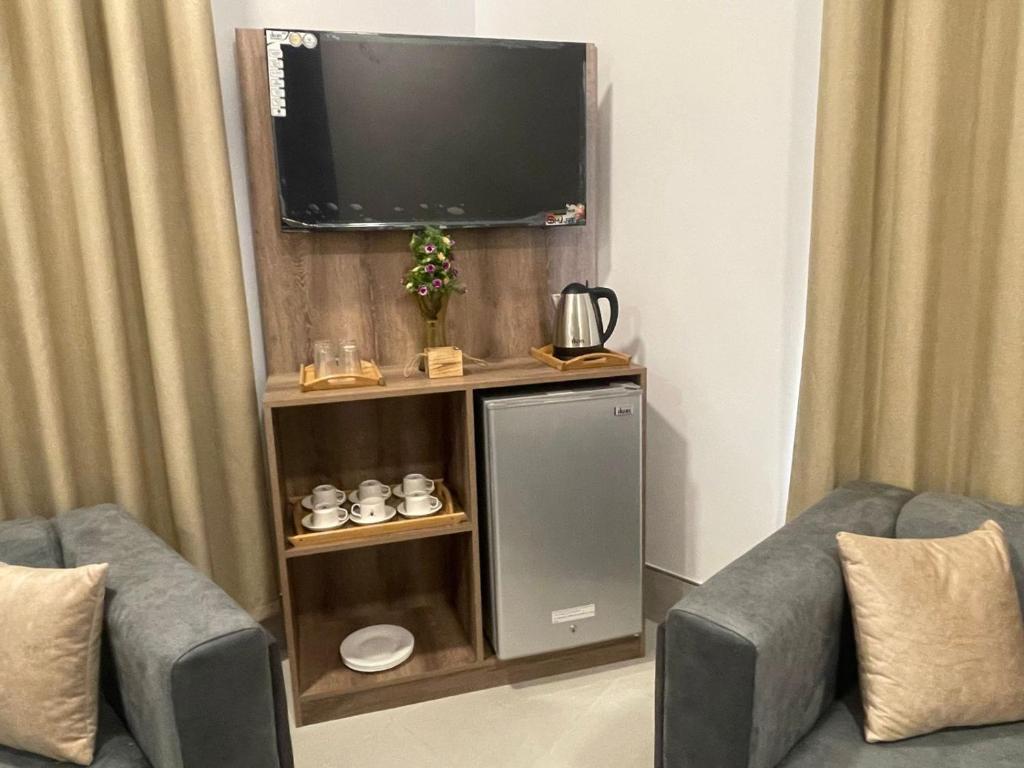TV a/nebo společenská místnost v ubytování ALOEVERA VILLAS & CAFA