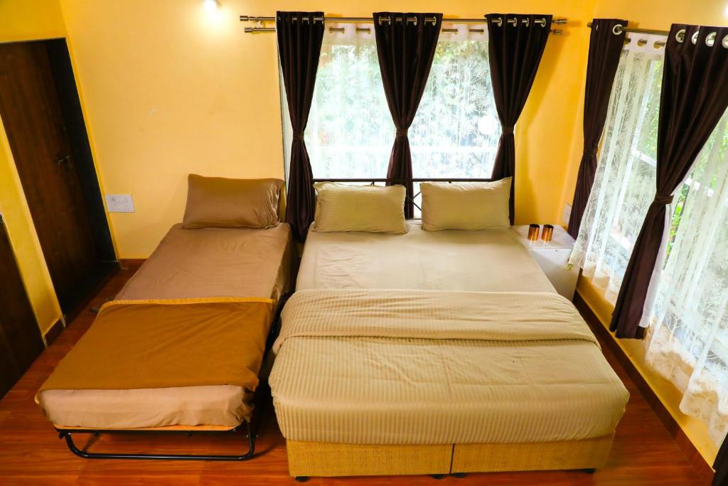 Postel nebo postele na pokoji v ubytování The Kille Torna Resort