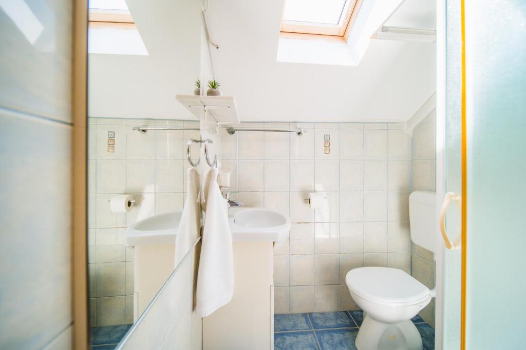 Koupelna v ubytování Rooms Denoble