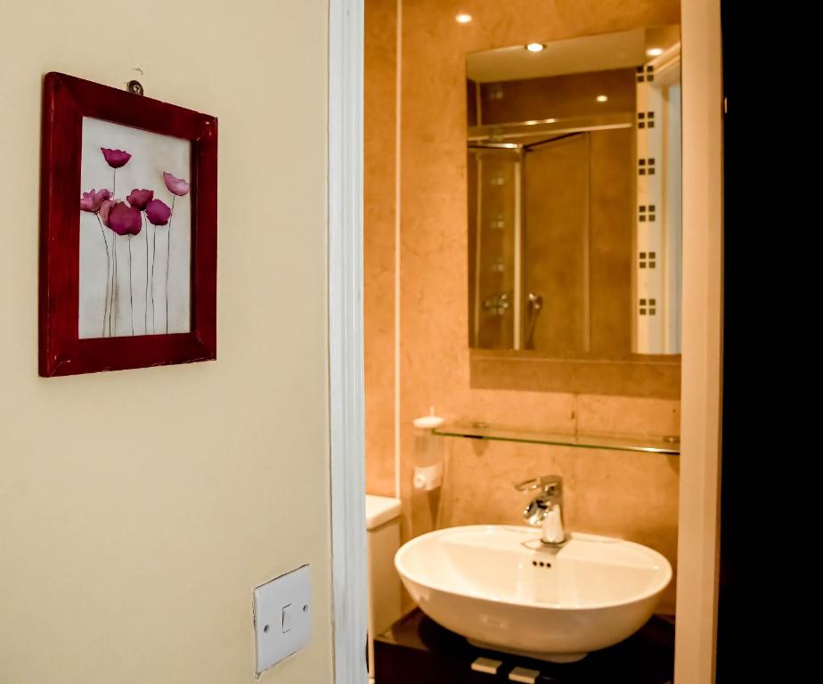 Koupelna v ubytování Shakespeare Hotel