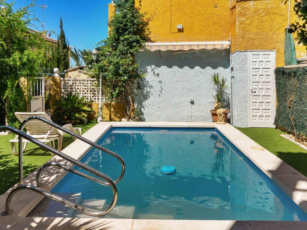 The swimming pool at or close to Holiday Home La Rosaleda by Interhome