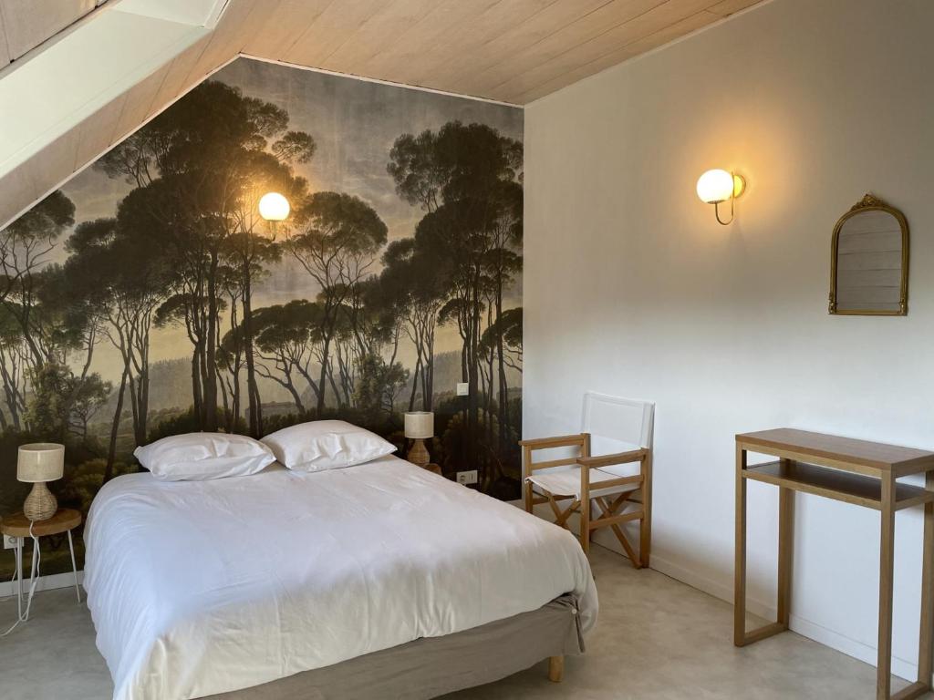 Ένα ή περισσότερα κρεβάτια σε δωμάτιο στο Gîte de Masne