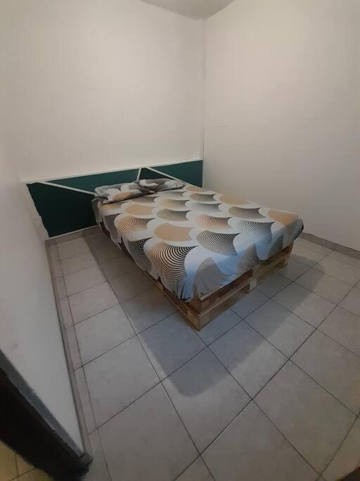 Postel nebo postele na pokoji v ubytování Cœur De Ville 4