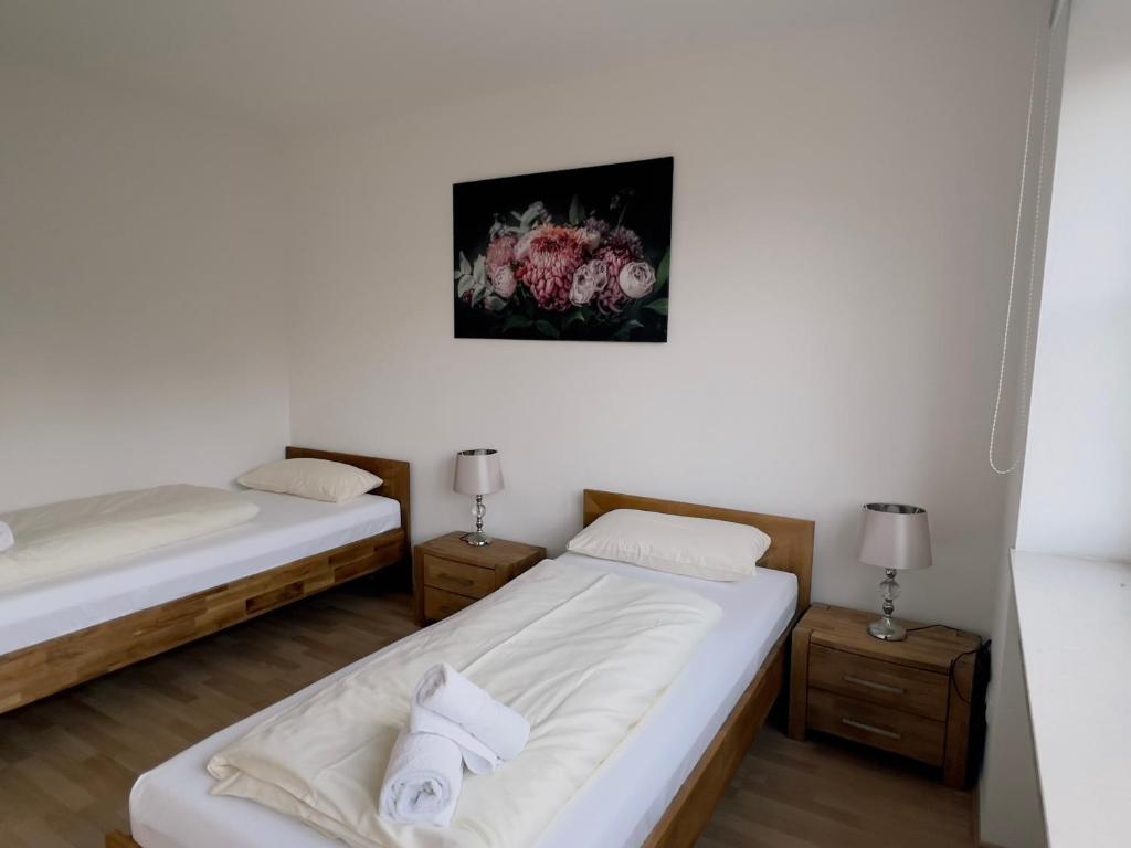 Postel nebo postele na pokoji v ubytování Alter Wirt Thalkirchen