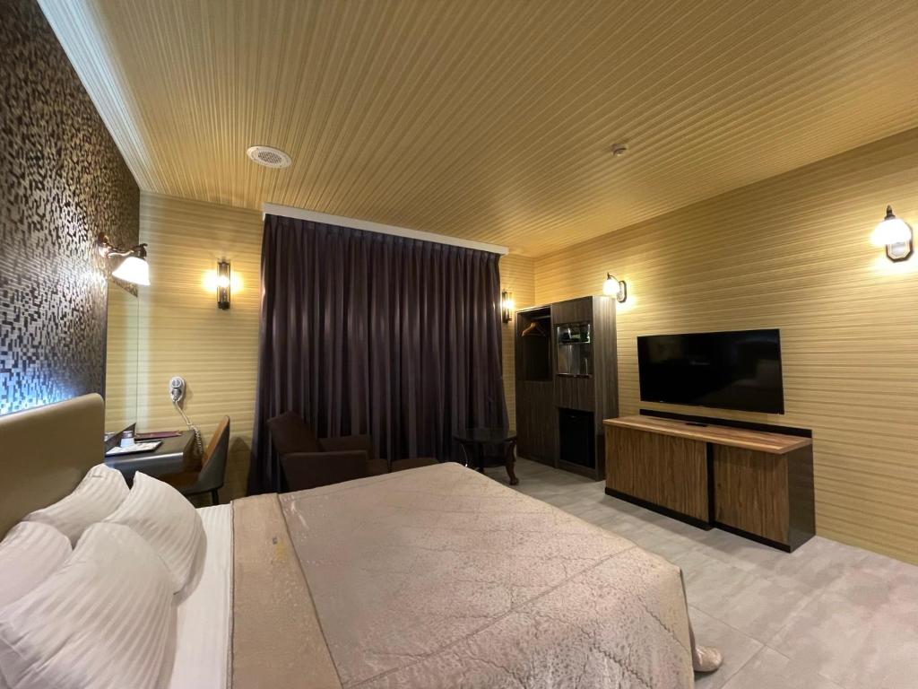 TV a/nebo společenská místnost v ubytování King & Princess Motel - Rende