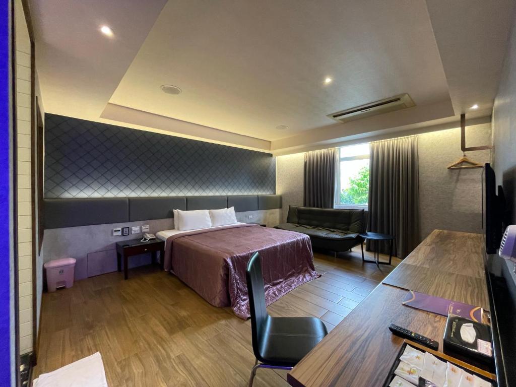 Postel nebo postele na pokoji v ubytování King & Princess Motel - Rende