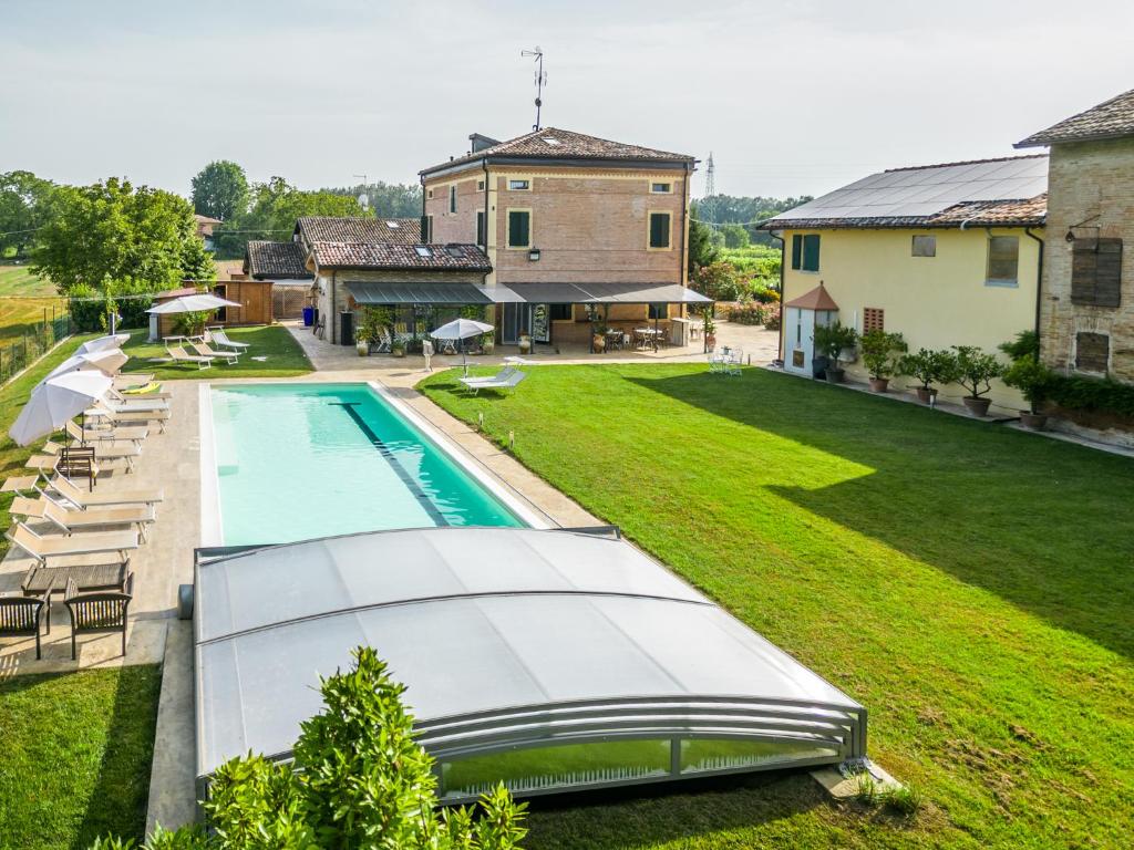 an aerial view of a house with a swimming pool at La Casa di Valeria - Modena in Modena