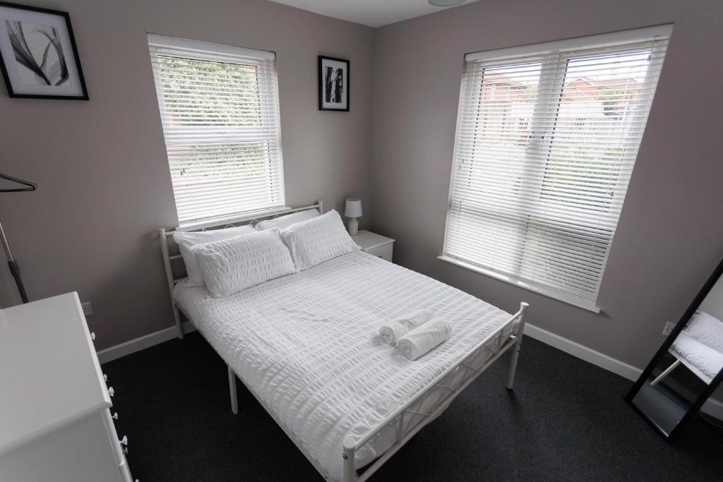 Postel nebo postele na pokoji v ubytování 2 Bedroom Ground Floor Apartment